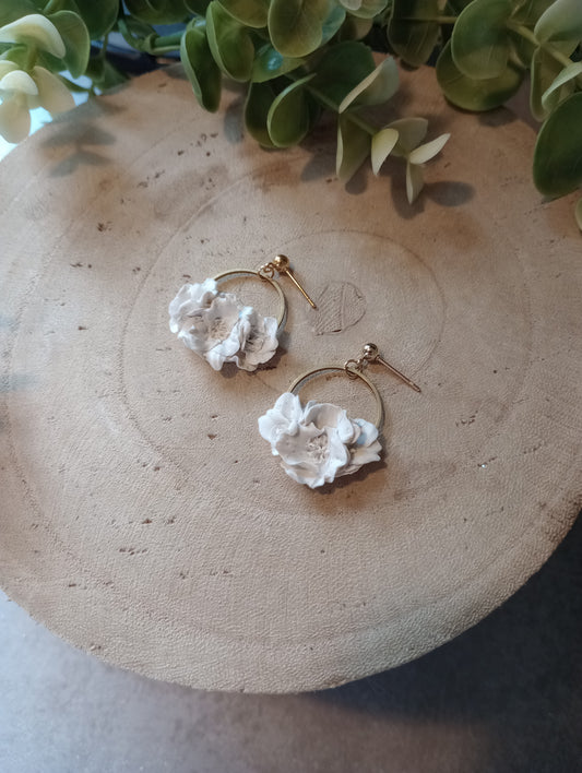 White floral circle earrings